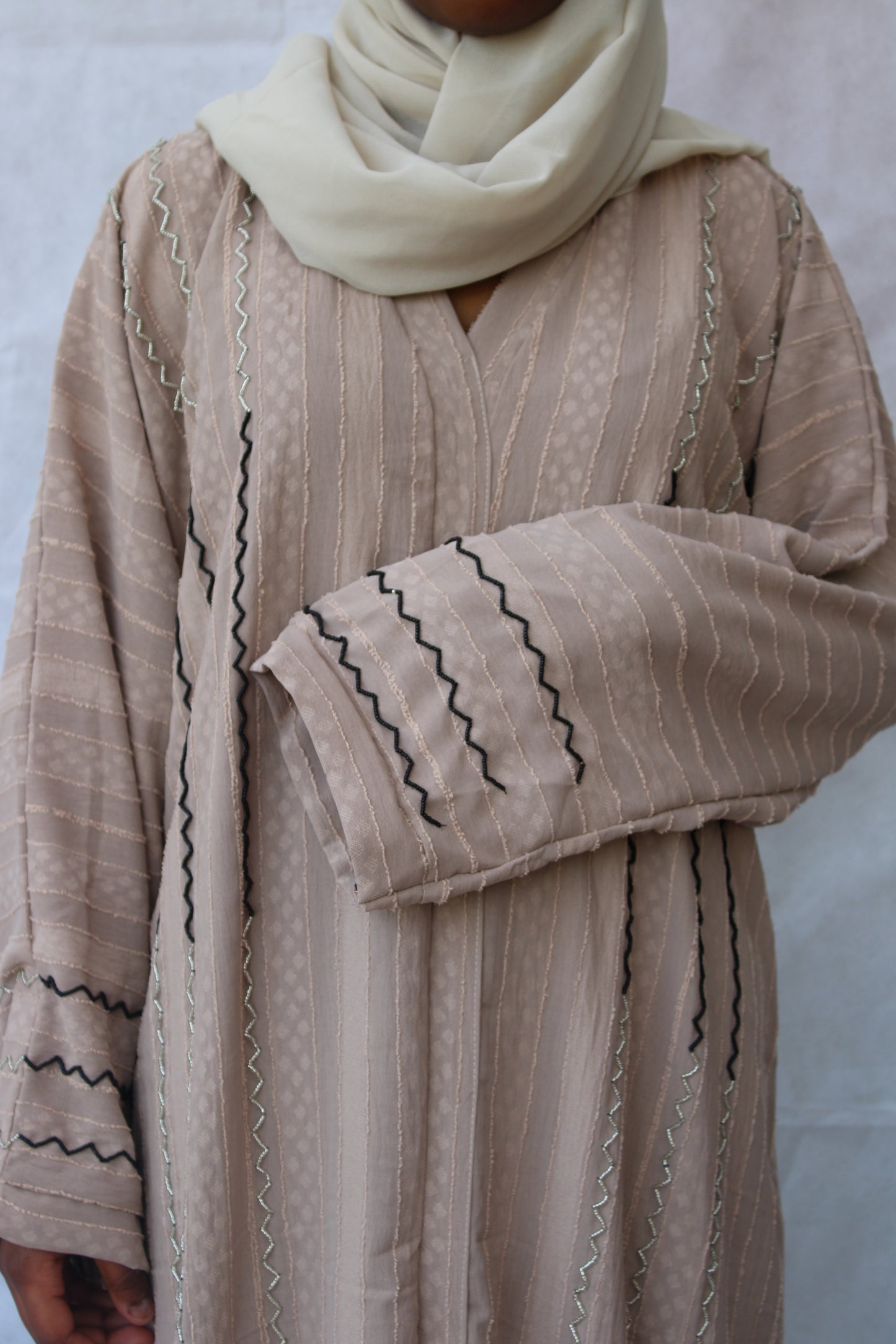 beige abaya with embroidery