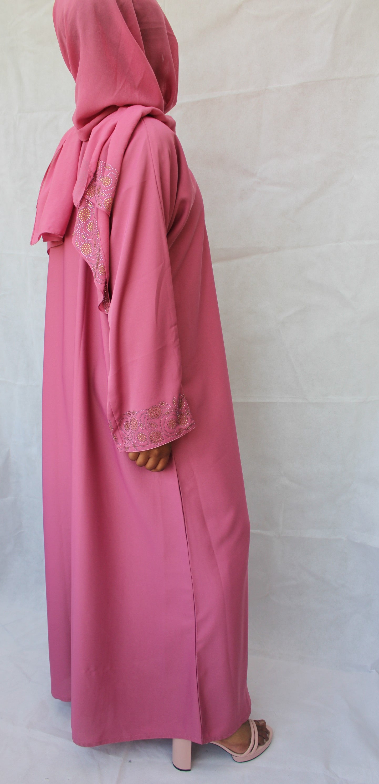 pink abaya with gold details